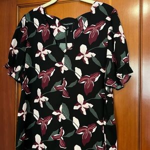 Gorgeous blouse that goes perfectly from a day in meetings to happy hour!